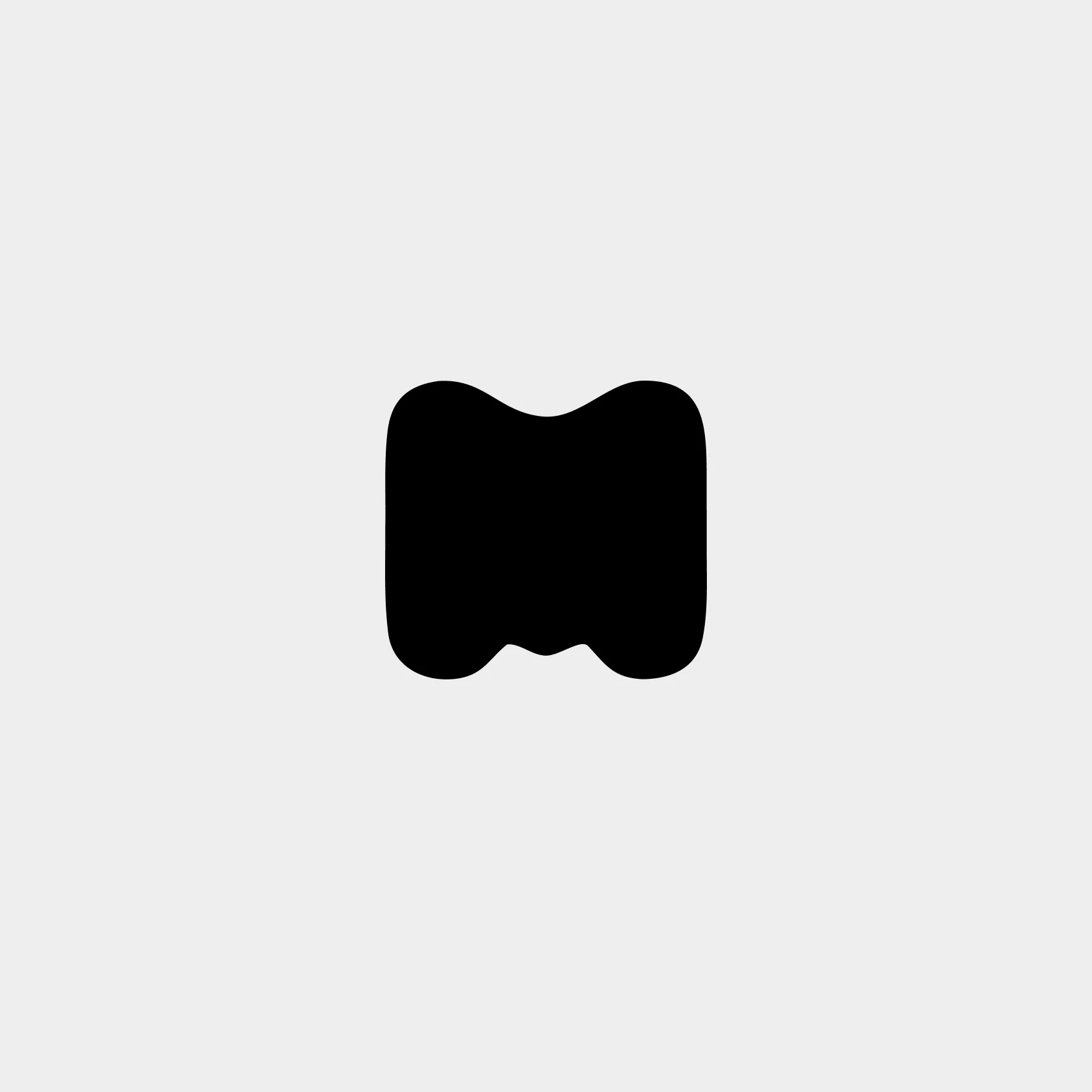 Black soft-edged geometric symbol