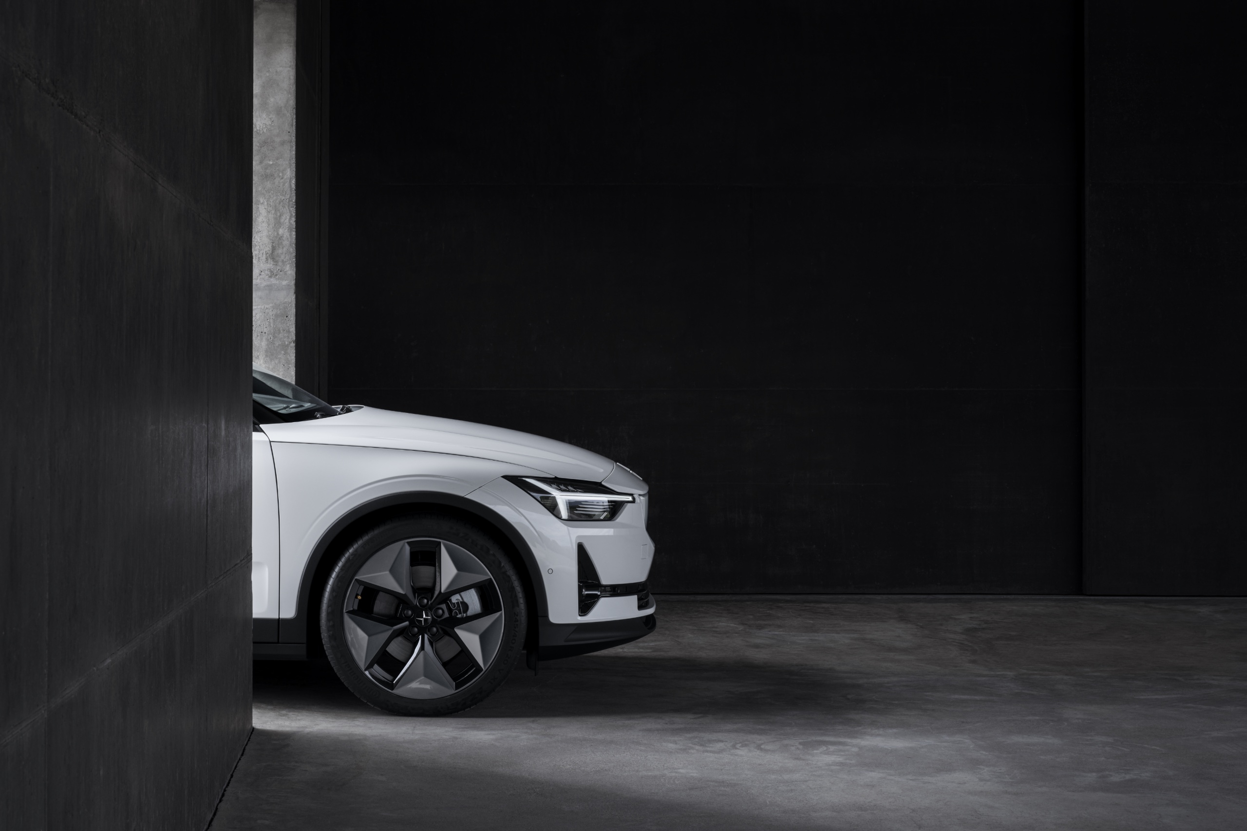 Polestar vehicle in a dark architectural space
